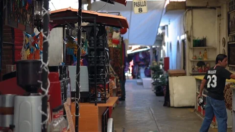 Local vendors setup open thier small stores in the Ciudadela Market Video stock 129396608