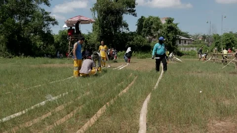 Local voluntary firefighters preparing the fire hose Stock-Footage 131038595