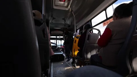 Local young men getting on a bus in South America.MOV Stock Footage 277631067