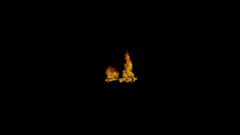 Localized Intense Fire Spot against black used as Compositing Element Stock Footage 327506318