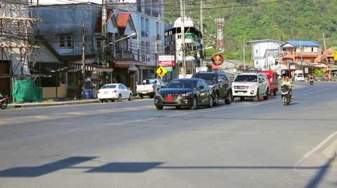 Locals are actively using scooters, Phuket, Thailand Stock Footage 51060641