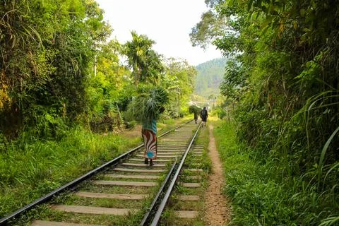 Locals going through The main line railroad at Ella, Sri Lanka. The line be.. Stock Photos