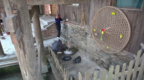 Locals working in village Stock Footage 49060889
