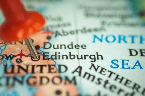 Location Edinburgh, push pin on map close-up, marker of destination for trave Stock Photos
