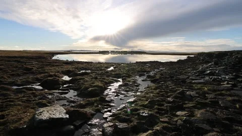 Loch of the tarf on a flat calm day on Swona in Orkney in HD Video stock 300135405
