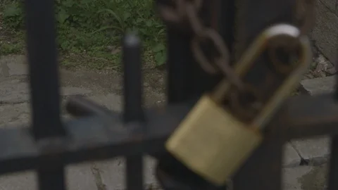 Lock And Chain Closing A Gate Stock Footage 118618231