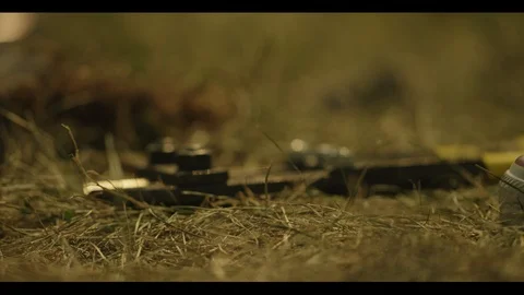 Lock and Chain Fall to the Grassy Ground HD Video Vídeo Stock 92800983