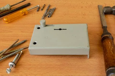Lock and tools to install it on the table 스톡 사진