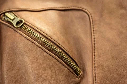 Lock on brown leather jacket Stock Photos