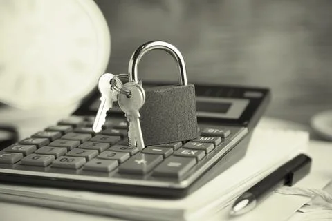 Lock on calculator Stock Photos