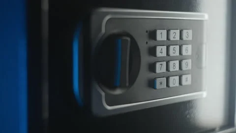 Lock code on a closed safe. Secure password pad numbers on protection safety box Video stock 220231458