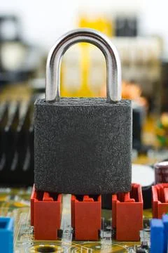 Lock on computer board Lock on computer board, security concept background... Stock Photos