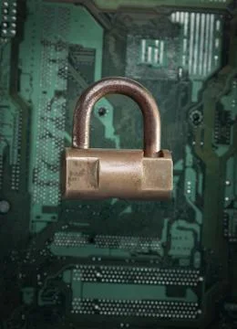 Lock on computer motherboard. Internet data privacy information security conc Stock Photos