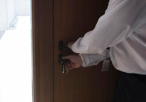 Lock the door with a key Stock Photos