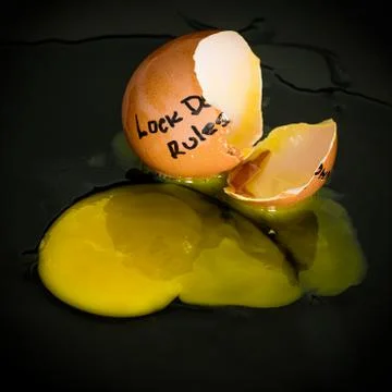 Lock down egg rules Stock Photos