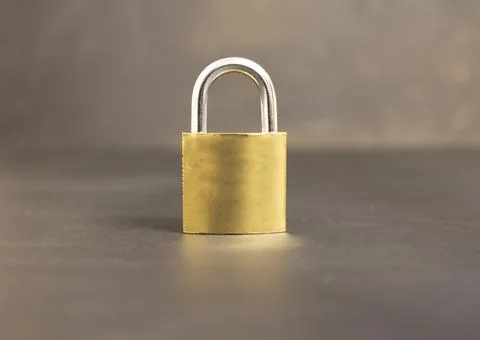Lock on a gray background Stock Photos