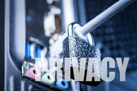 Lock hanging on a network cable. Stock Photos