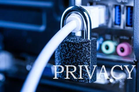 Lock hanging on a network cable. Stock Photos