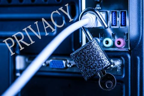 Lock hanging on a network cable. Stock Photos