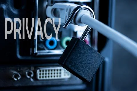 Lock hanging on a network cable. Stock Photos