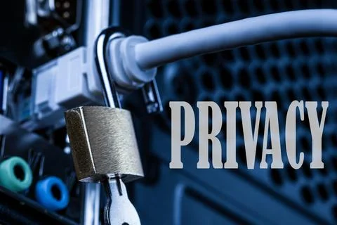 Lock hanging on a network cable. Stock Photos