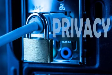 Lock hanging on a network cable. Stock Photos