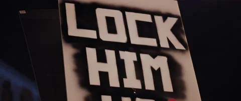 Lock Him Up Sign during protests Stock Footage 152840884