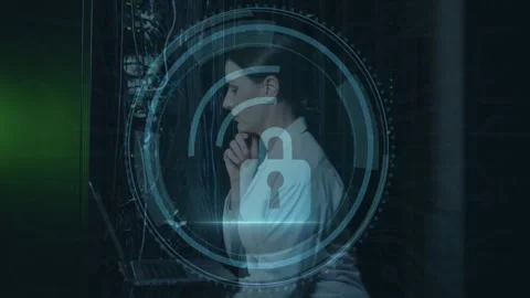 Lock icon and security animation over woman working in server room Stock Footage 326425273
