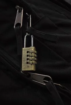 The lock on a lightning on a black bag Stock Photos