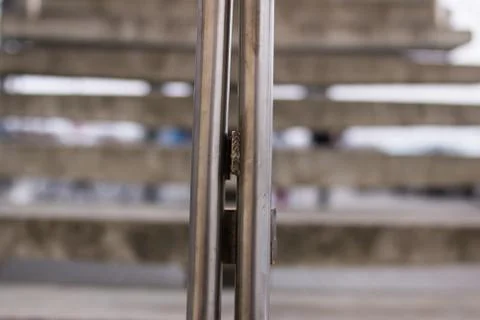 Lock on a metal gate close up Stock Photos