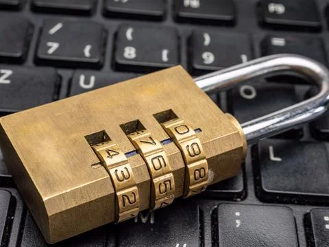 Lock with number code on keyboard Фото