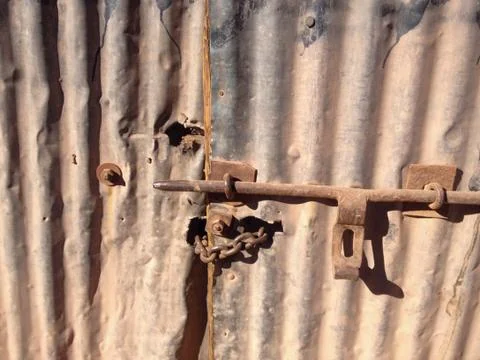 Lock old rusty brown door Stock Photos