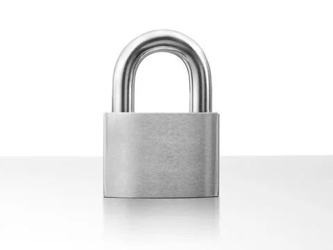 Lock padlock on white table Stock Photos