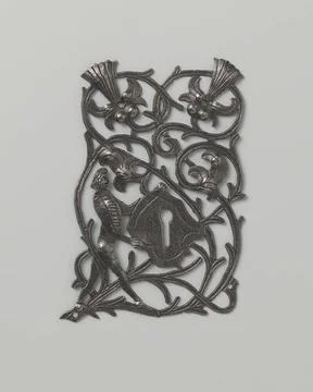 Lock plate. Openwork lock plate from tinned iron. In basic form rectangula... Stock Photos
