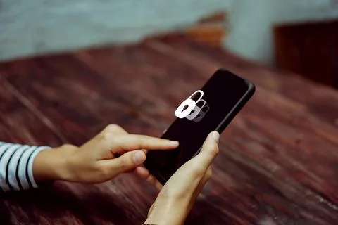Lock sign security system icon screen on smartphone show feel safe in socia.. Stock Photos