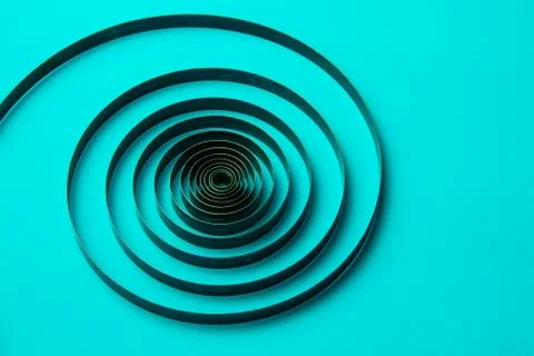?lock spring on a blue background, metal spiral Stock Photos