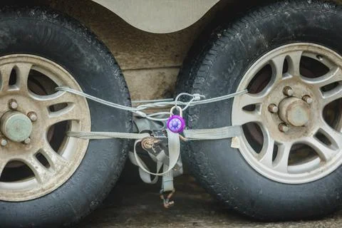 Lock, Strap and Cables Locking Wheels of a Truck During Freedom Convoy Protes Stock-Fotos