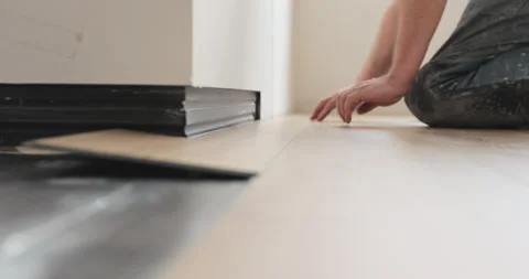 Lock type laminate lock connection. Laminate installation. Stock Footage 240633984