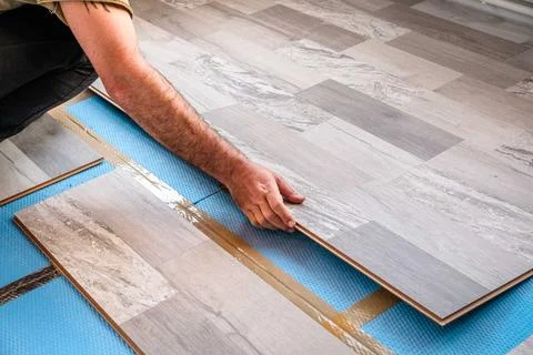 LOCK type laminate lock connection - how to lay a floating floor Stock Photos