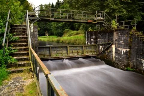 Lock water rust old broken long exposure river rusted dilapidated Stock Photos