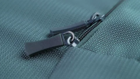 Lock zipper of a colored tourist backpack Stock Footage 220704345
