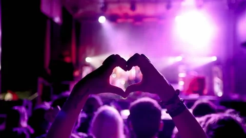 Lockdown: Close-up of Hand-shaped Heart at a Concert - Oahu, Hawaii Stock Footage 149712854