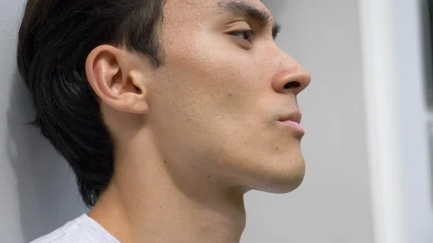 Lockdown close-up portrait of handsome young man Stock-Footage 114873004