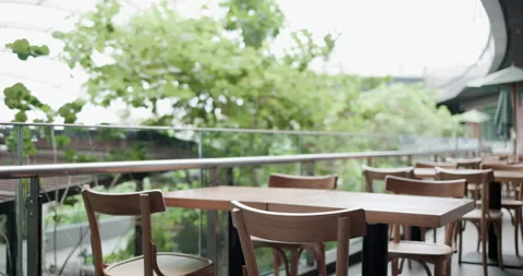 Lockdown concept. Restaurant table with no people cause COVID-19 outbreak Stock Footage 158362650