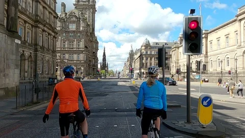 Lockdown Edinburgh Covid 19 Coronavirus 2020 cyclists in Edinburgh Scotland Stock Footage 129890957