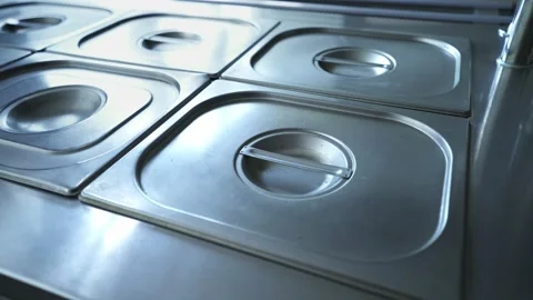 Lockdown. An empty café without customers. Metal box for food. Empty counter. Stock-Footage 147754082