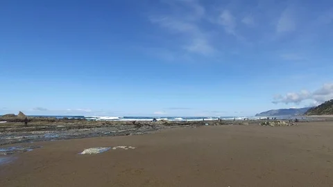 Lockdown of Rocky Beach and Ocean Stock Footage 87927226