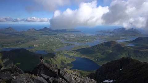 Lockdown shot of man standing and admiring the scenic view Stock Footage 114881514