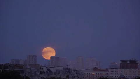 Lockdown Shot Of Moon Behind Buildings In City Against Sky At Twilight - Paris, Stock Footage 272712784