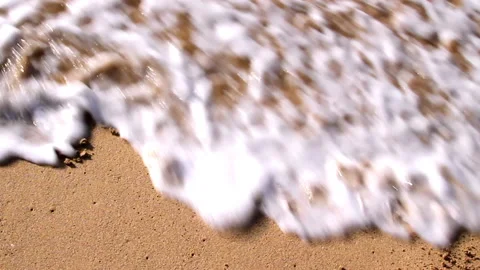 Lockdown Shot Of Ocean Water Splashing On Text At Beach - Kauai, Hawaii Stock Footage 206323282